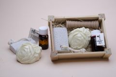 Box no. 2 containing small oil, soap, pimouse stone and hand massage rod